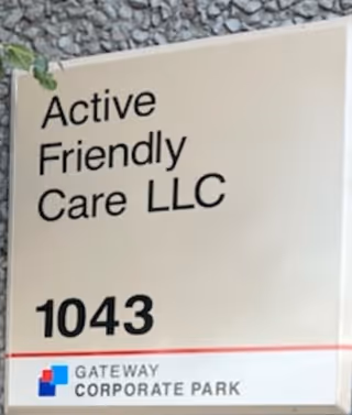 Exterior sign reads Active Friendly Care LLC and 1043.