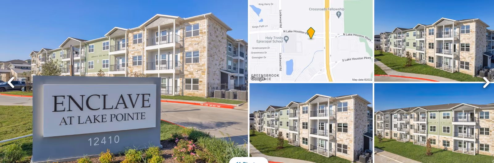 Exterior view of Enclave at Lake Pointe with stone facade and sign.