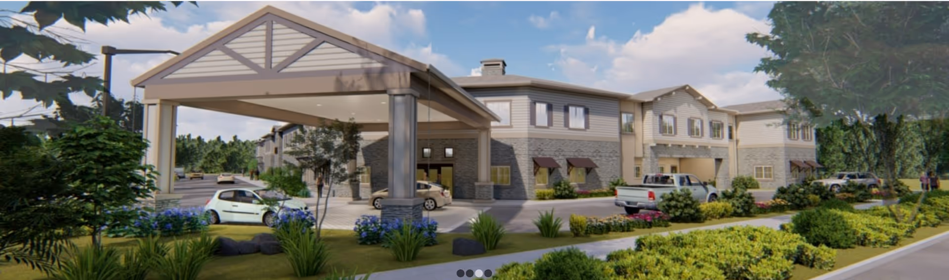 Exterior view of The Lodge at Piner Road senior living facility with entrance and landscaping.