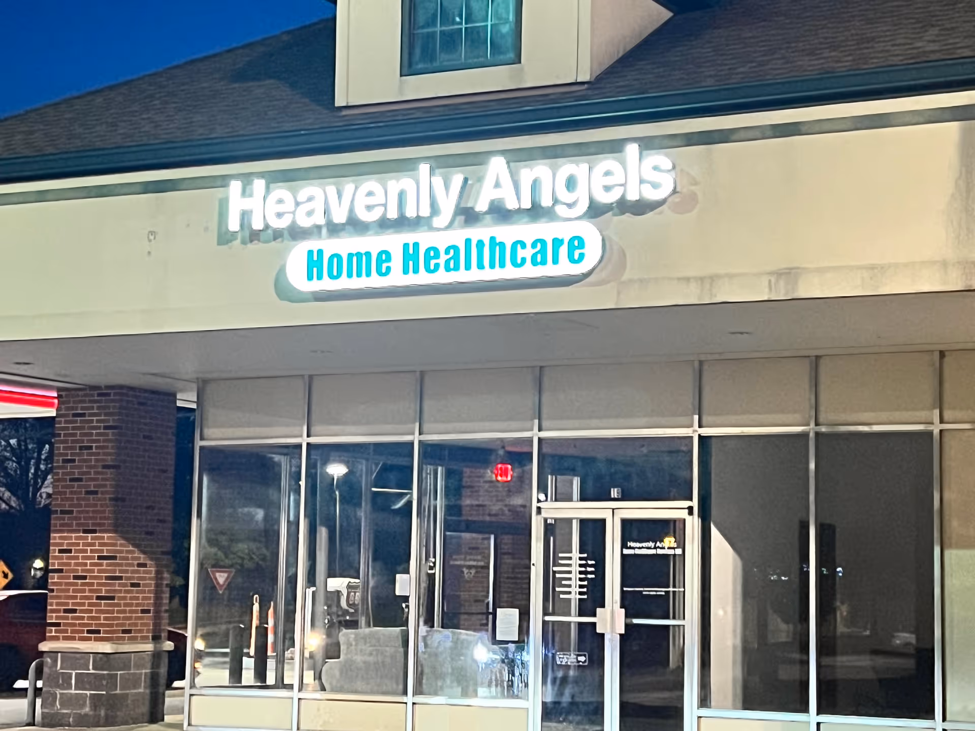 Exterior view of Heavenly Angels Home Healthcare storefront with glass doors.