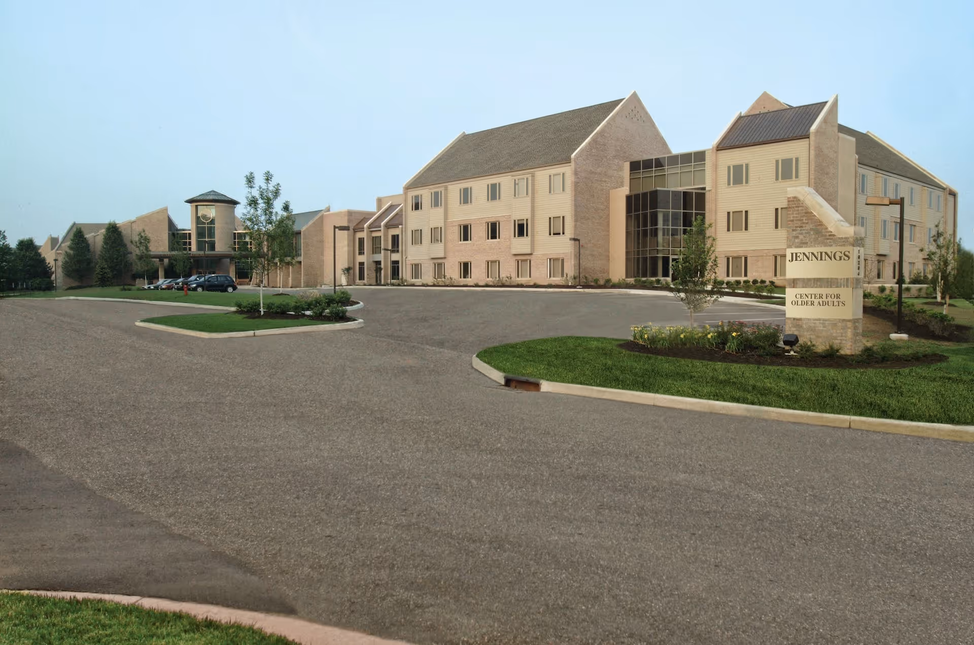 Exterior view of Jennings facility with circular driveway and landscaped entrance.