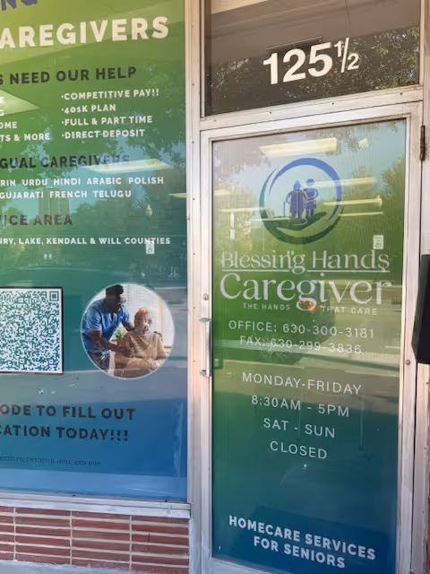 Front view of Blessing Hands Caregiver storefront with door sign and posters.