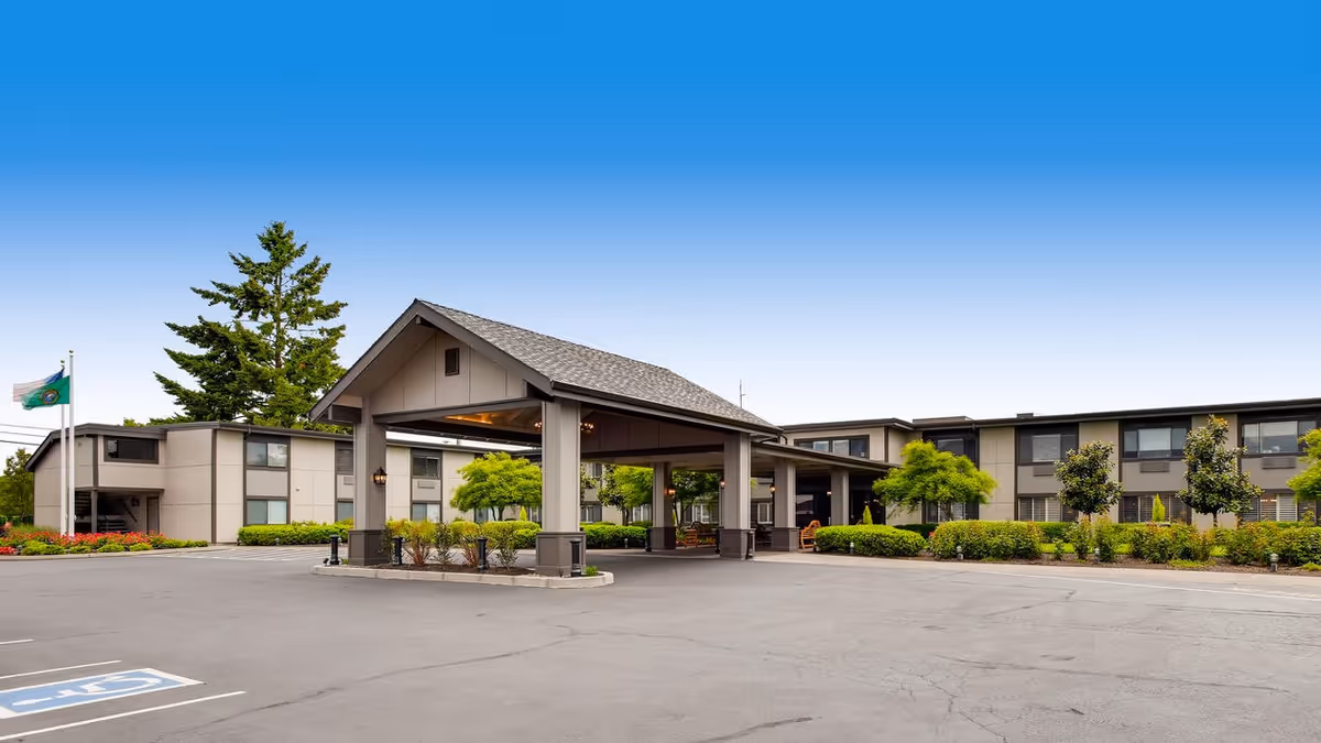 Exterior view of Cascade Inn Assisted Living Community with a covered entrance.