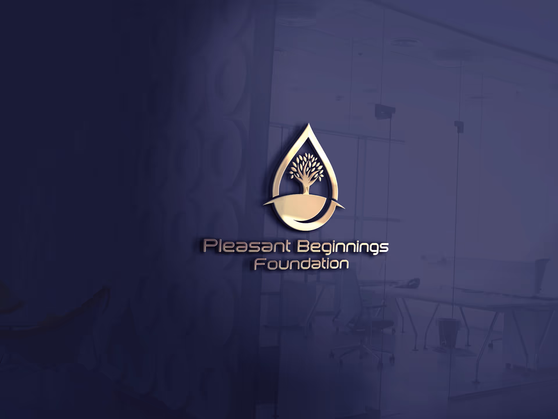 Pleasant Beginnings Foundation logo on glass wall inside an office conference room.