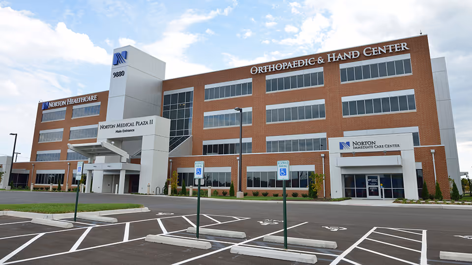 Front of Norton Healthcare Medical Plaza II Brownsboro with orthopaedic center entrance and parking.