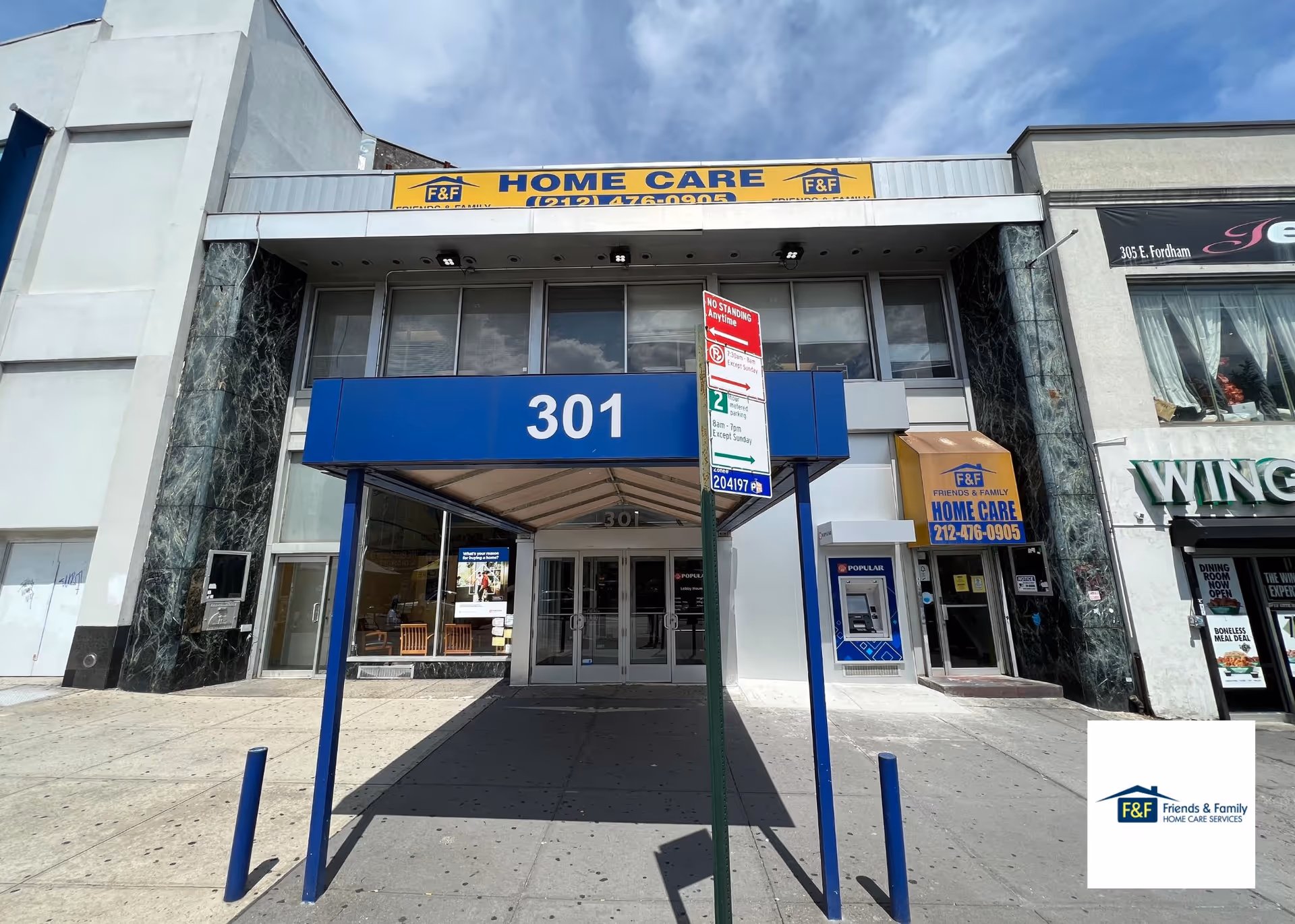 Front of a building with a blue canopy labeled 301 and home care signage.