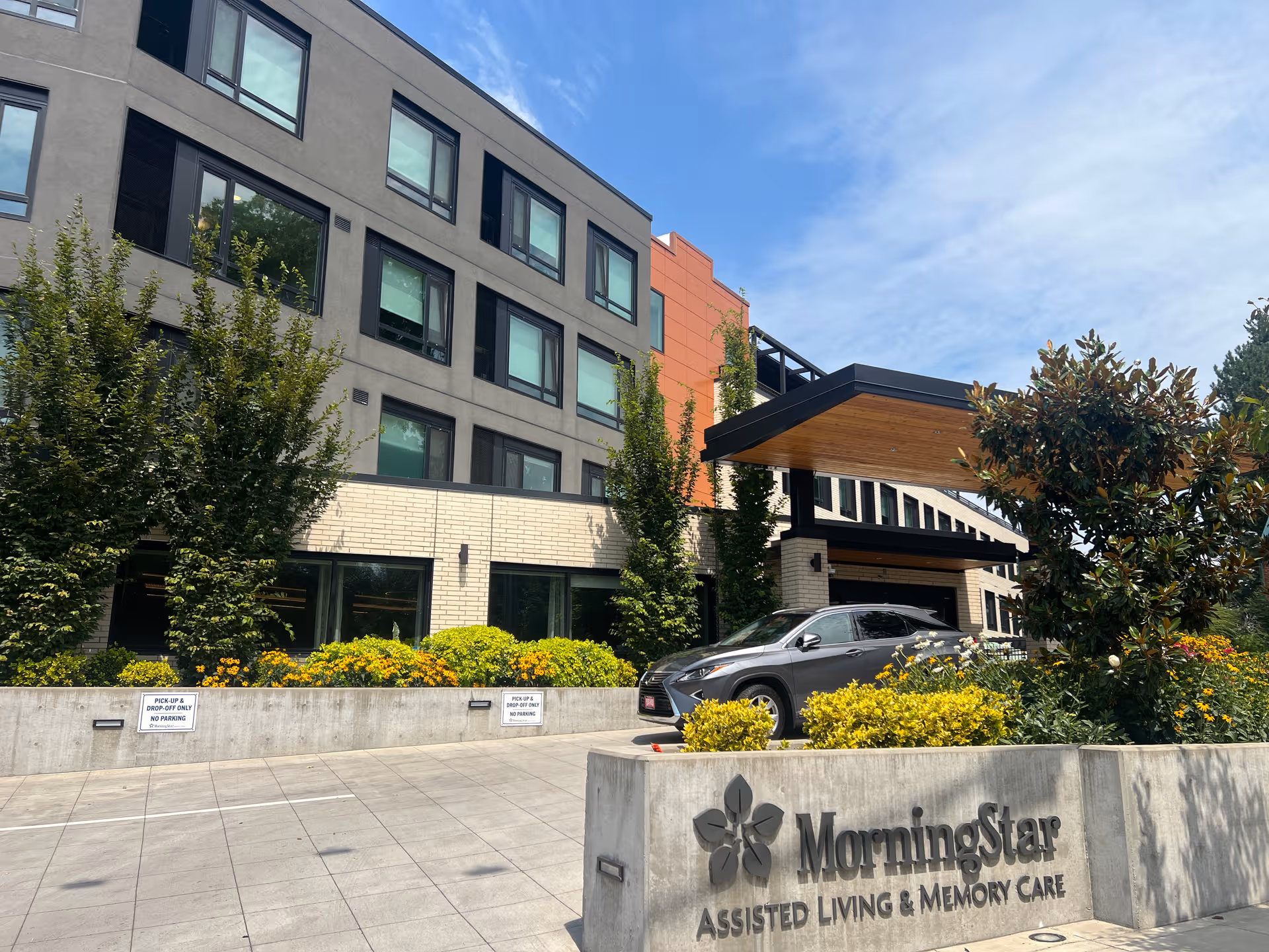 MorningStar senior living building facade with entrance, landscaping, and parking.