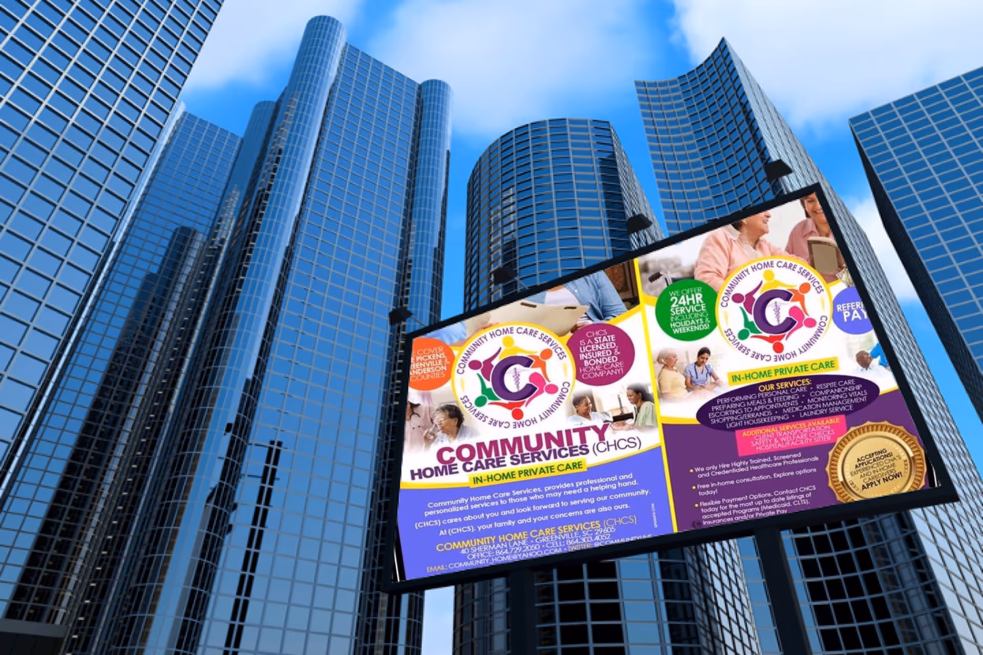 Tall blue glass skyscrapers surround a large outdoor billboard advertising Community Home Care Services.