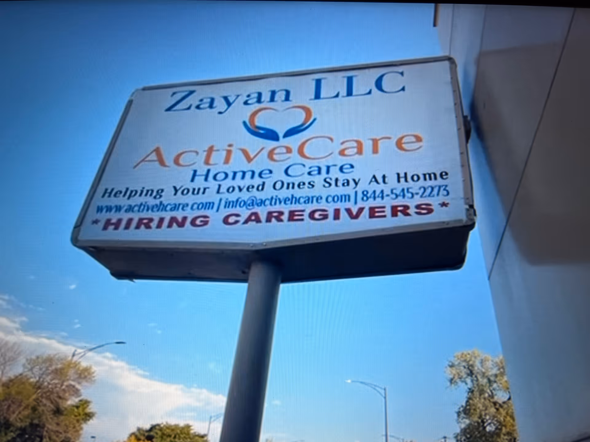 Outdoor sign on a pole for Zayan LLC ActiveCare Home Care.