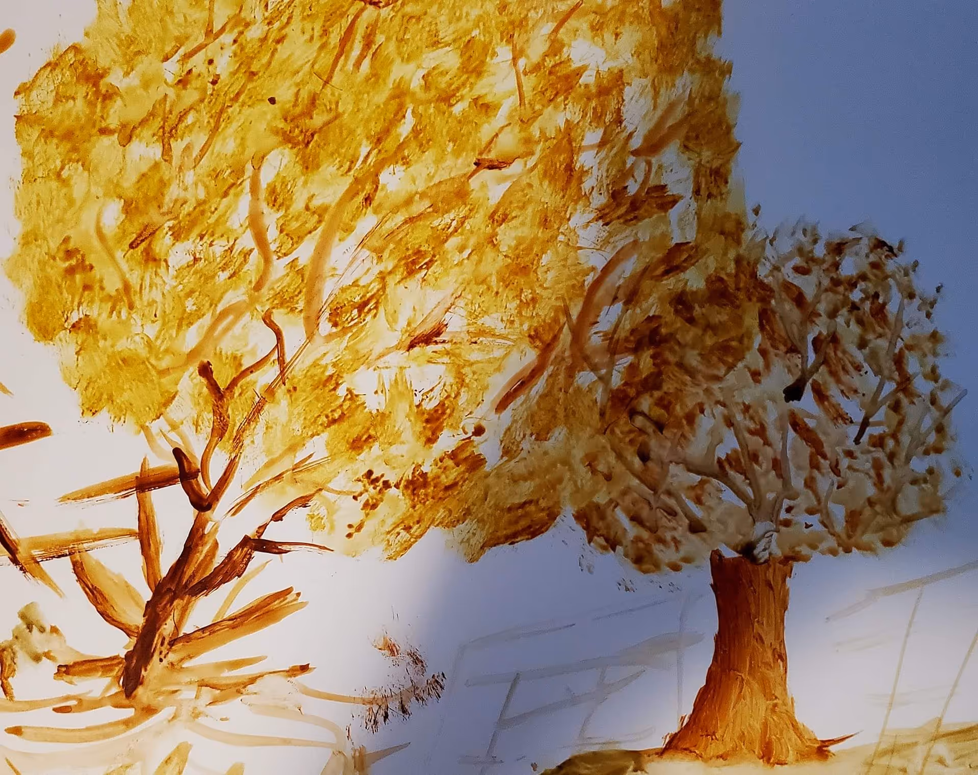 Interior wall mural depicting golden autumn trees in a hallway.