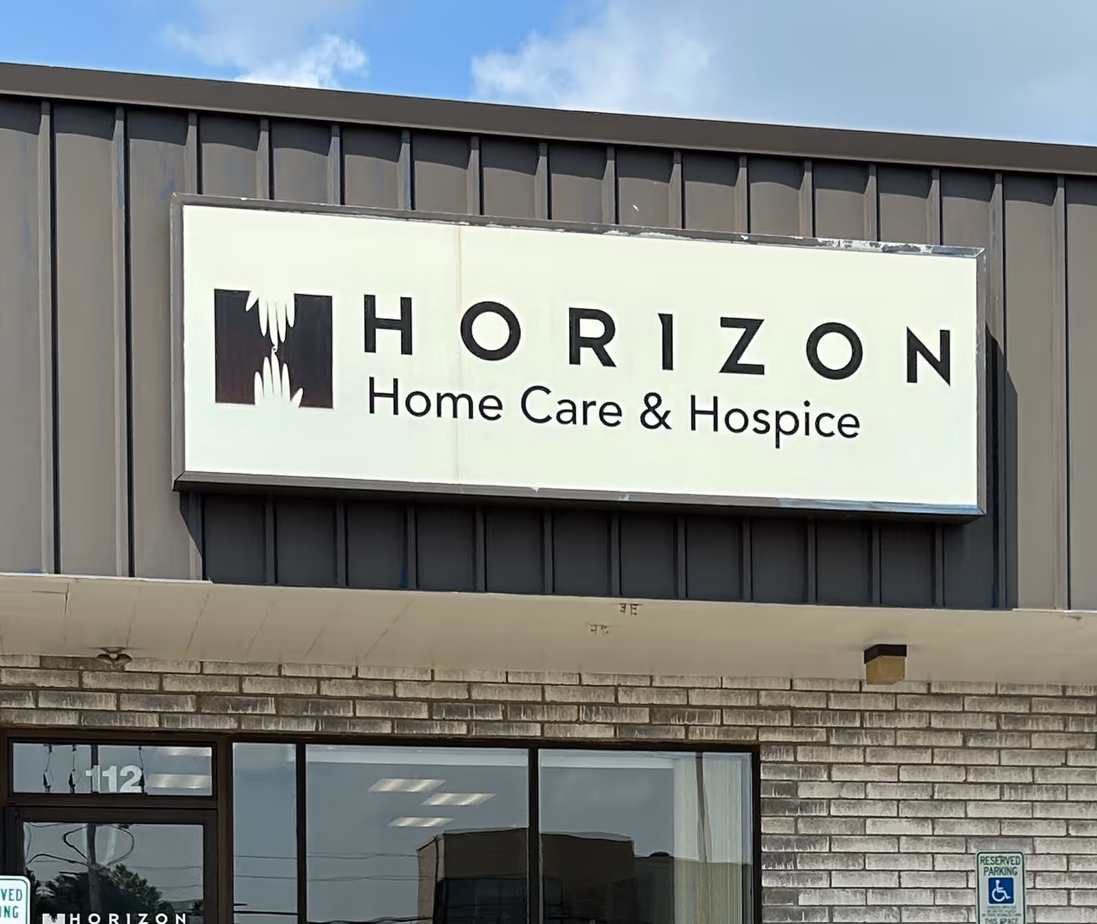 Front exterior of Horizon Home Care & Hospice building with a large sign.