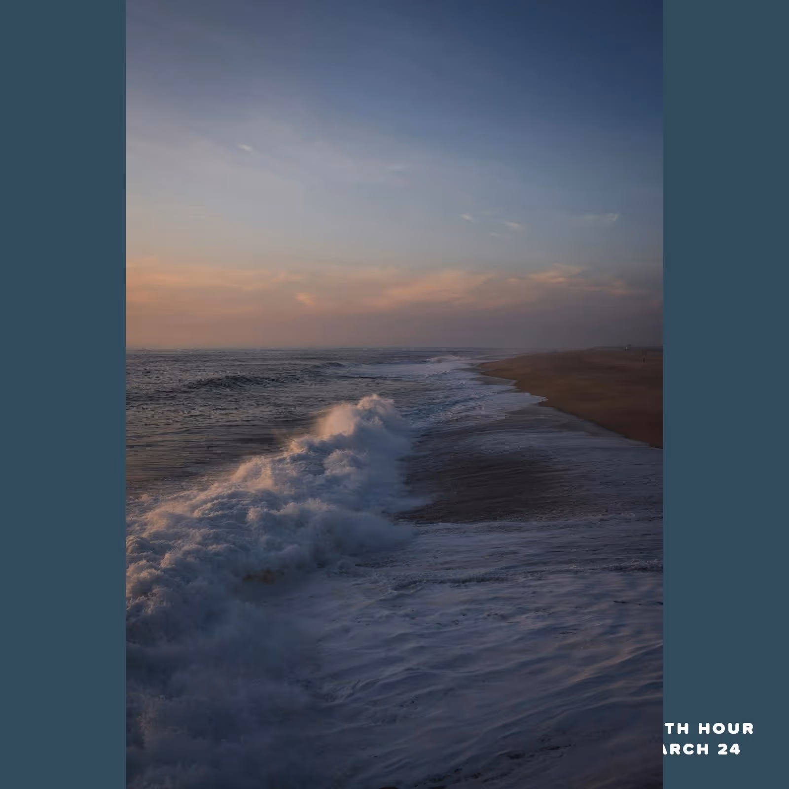 Ocean waves crashing onto a sandy beach during sunset with a partly cloudy sky.