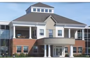 Front view of Christopher House Worcester building with brick exterior and white columns.