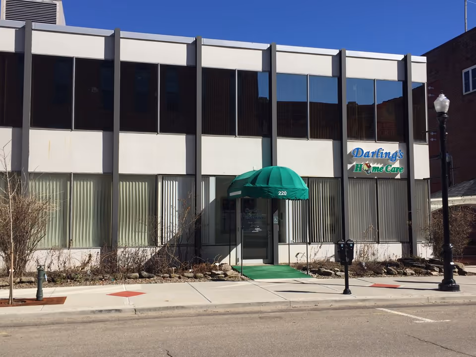 Front view of Darling's Home Care building with a green awning over the entrance.