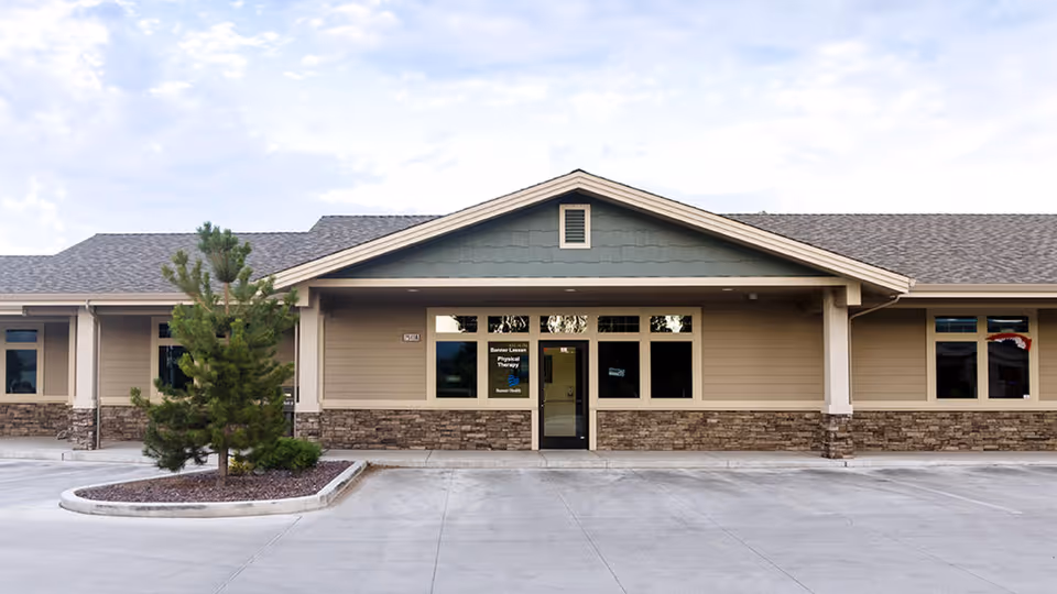 Front exterior of Banner Lassen Outpatient Physical Therapy building, single-story with stone accents.