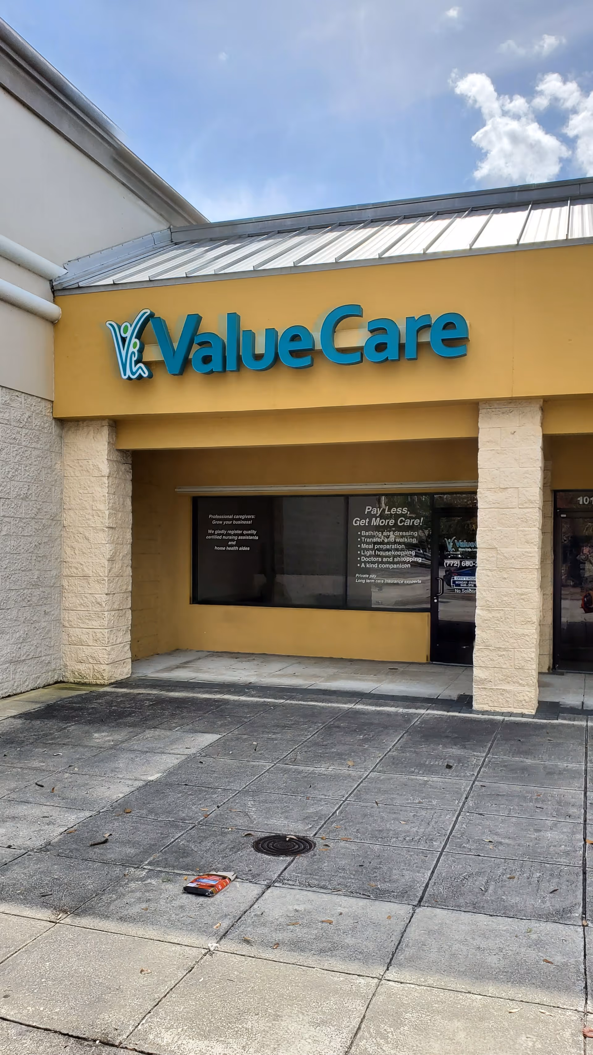 Front exterior of a ValueCare at Home facility with a yellow sign and entrance.