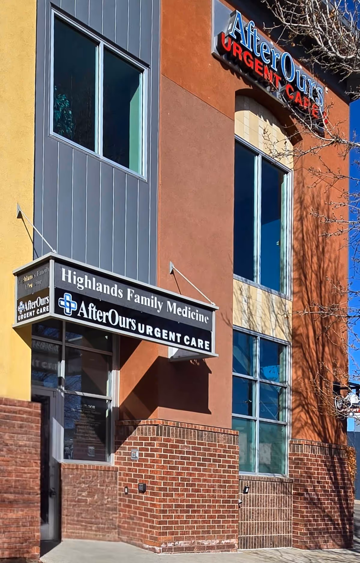 Exterior view of a colorful building with AfterOurs Urgent Care signage.