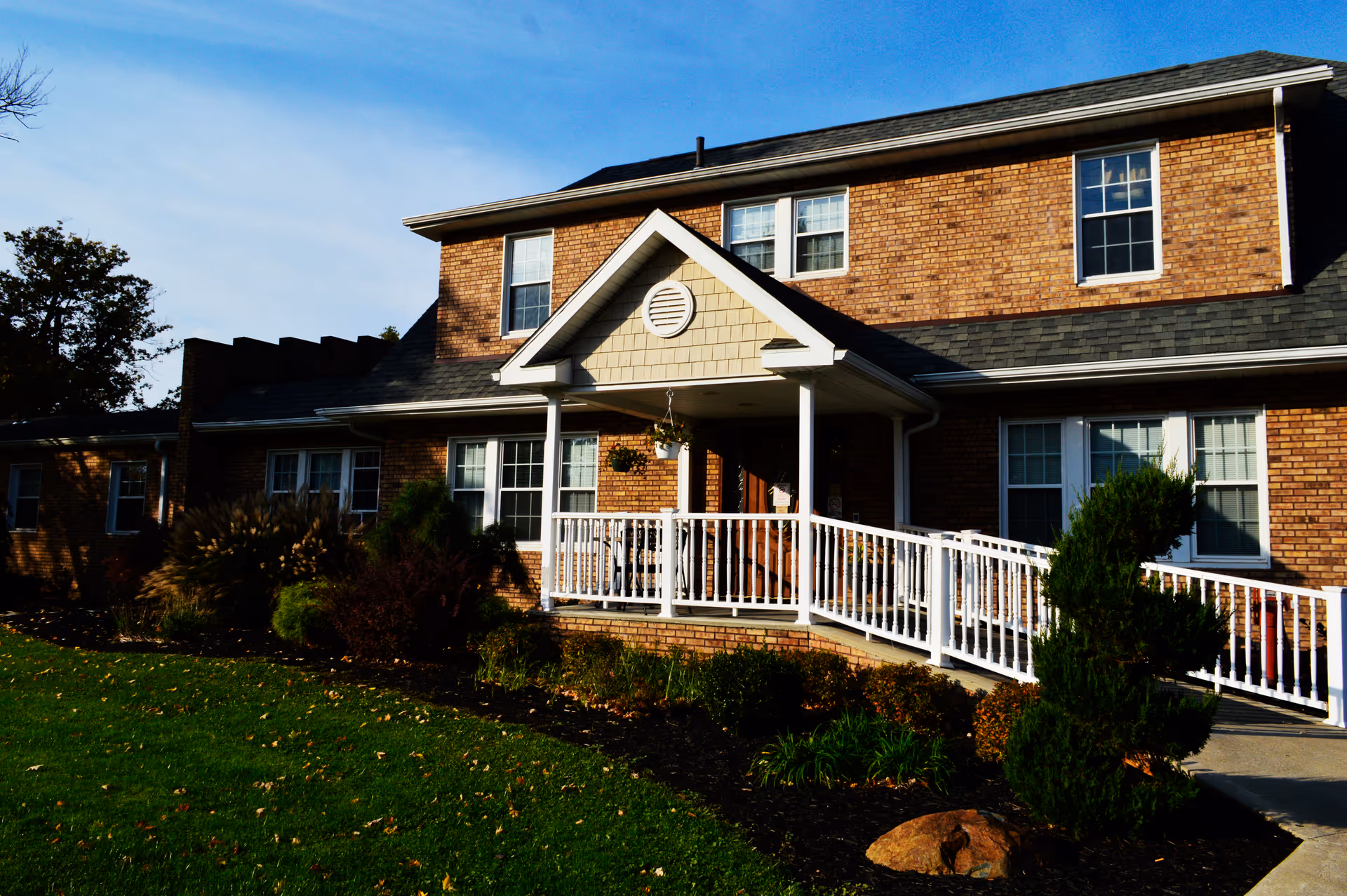Crystal Care Centers of Mansfield exterior: brick building, front porch, white railing, and accessible ramp.