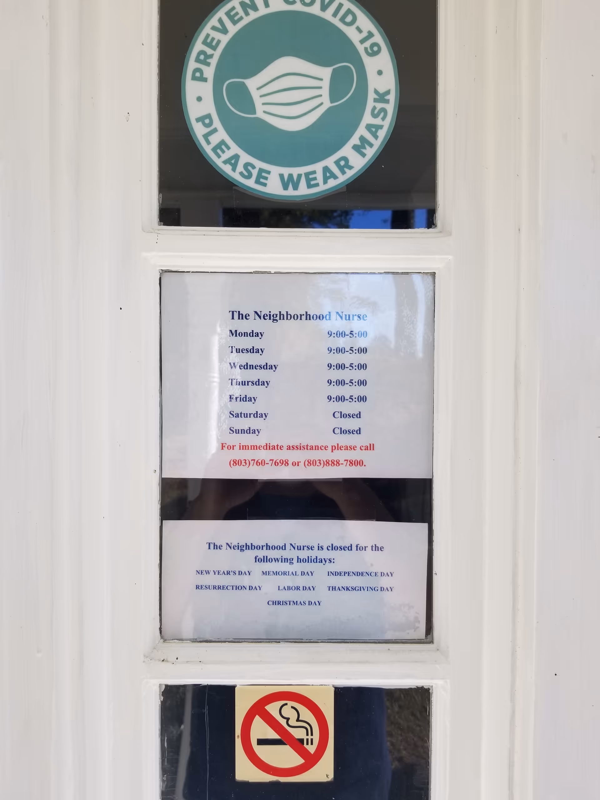Front door window displays a COVID mask sign and hours notice for The Neighborhood Nurse.