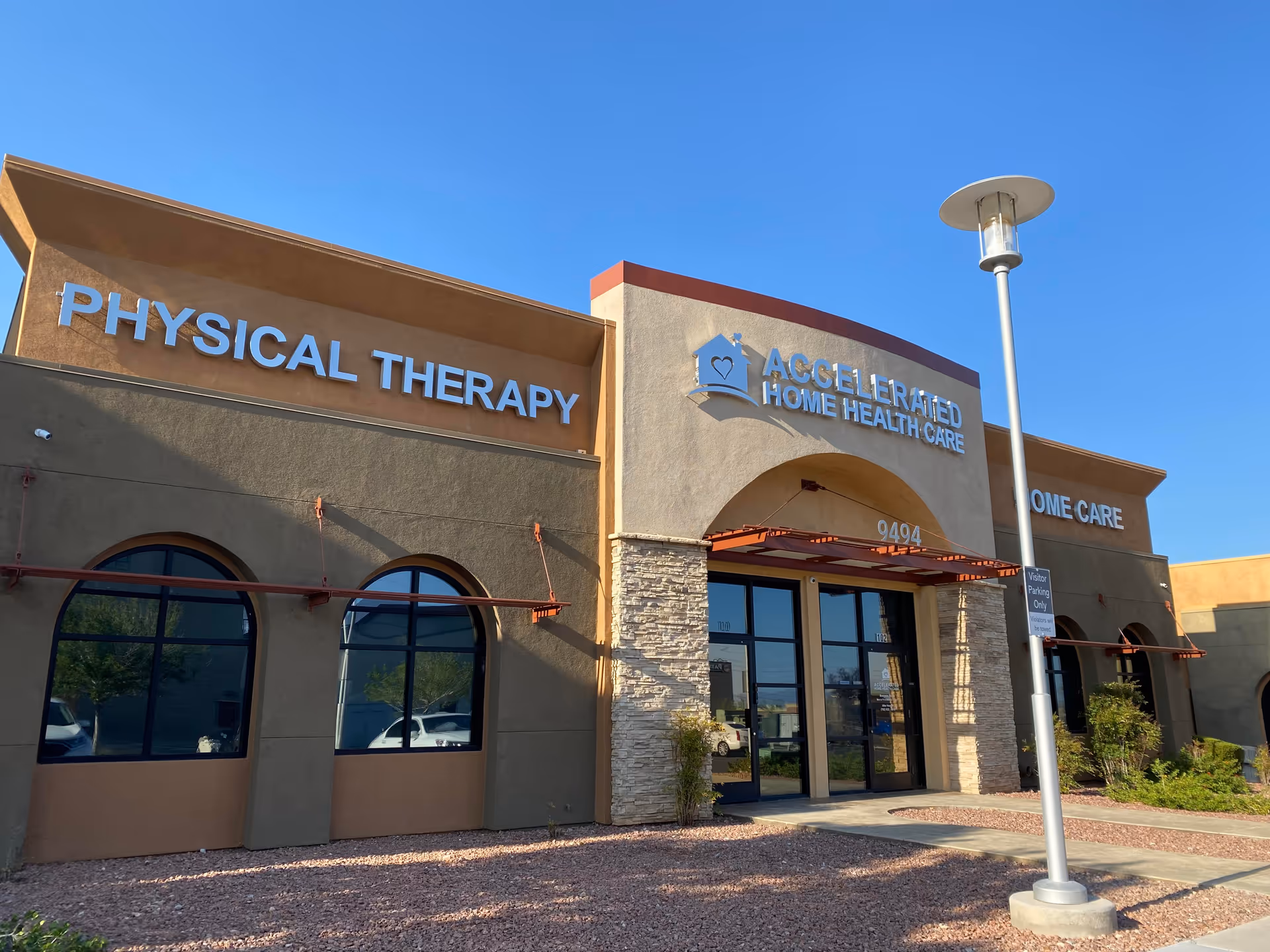 Exterior view of Accelerated Home Health Care facility with physical therapy sign and entrance.