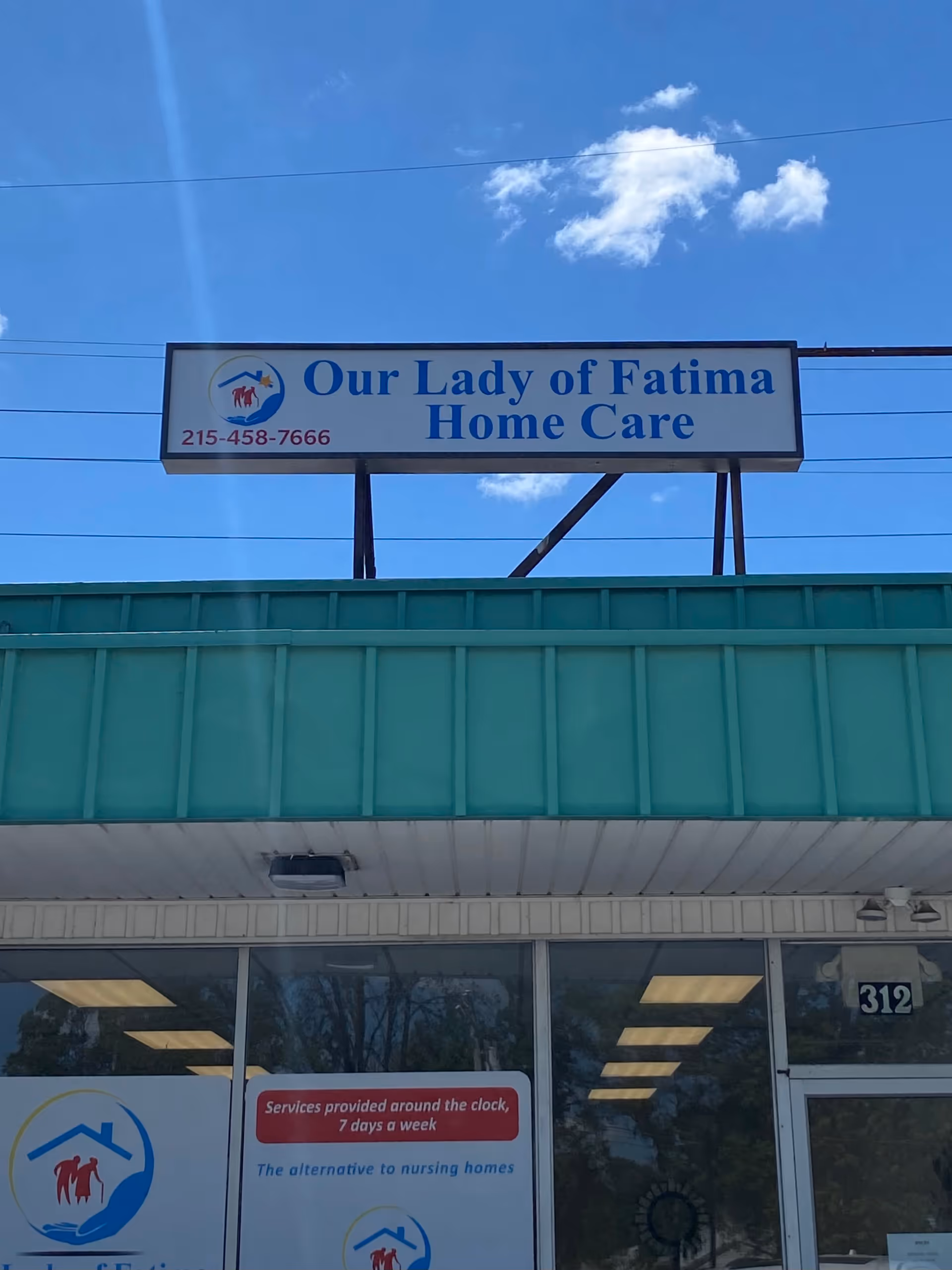 Exterior view of Our Lady of Fatima Home Care building with sign and entrance.