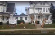Exterior view of Wyalusing Valley Retirement and Personal Care Home, two-story building with sign and stairs.
