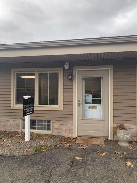 Front exterior of Susquehanna Home Health Care entrance with window and sign.