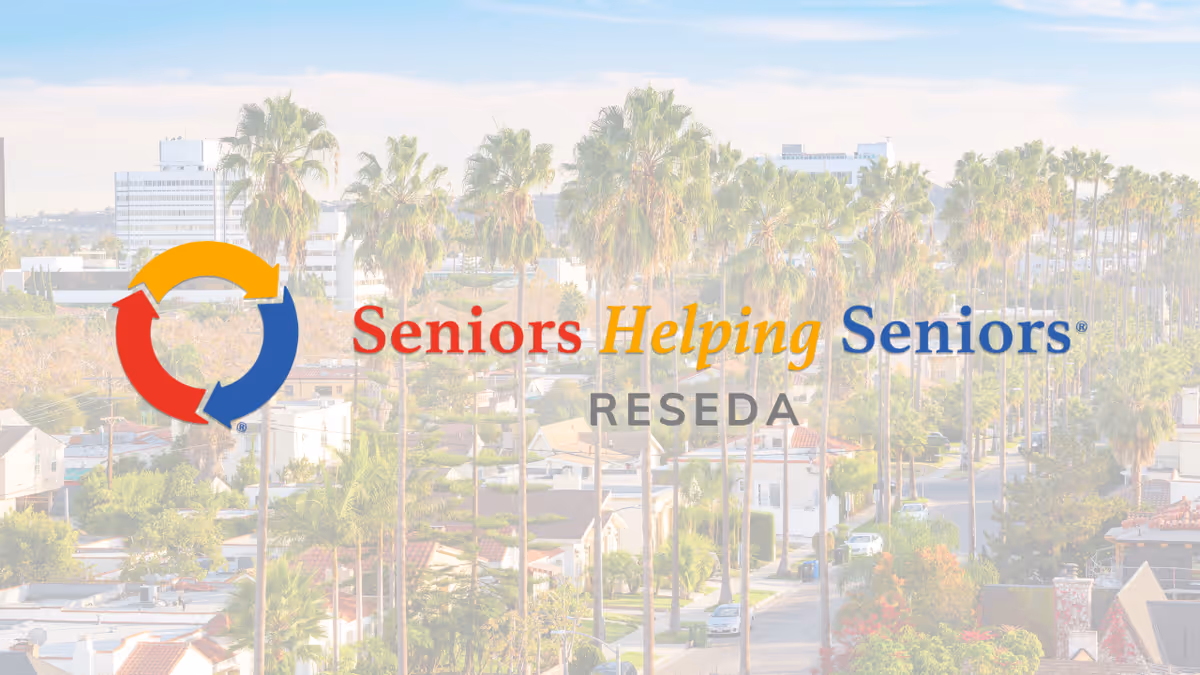 Outdoor city street with palm trees and the Seniors Helping Seniors Reseda logo.