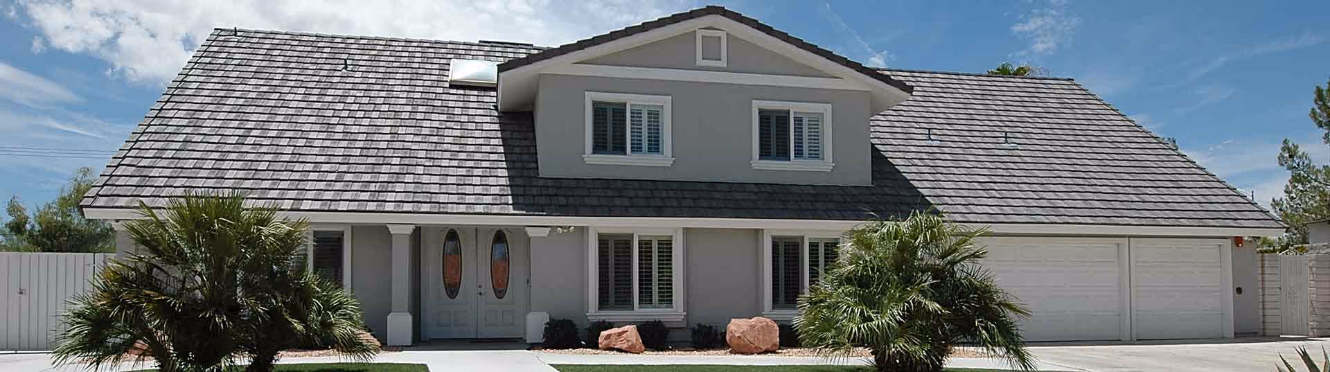 Front view of TLC Memory Care & Nursing Home Vegas building with roof and palm trees