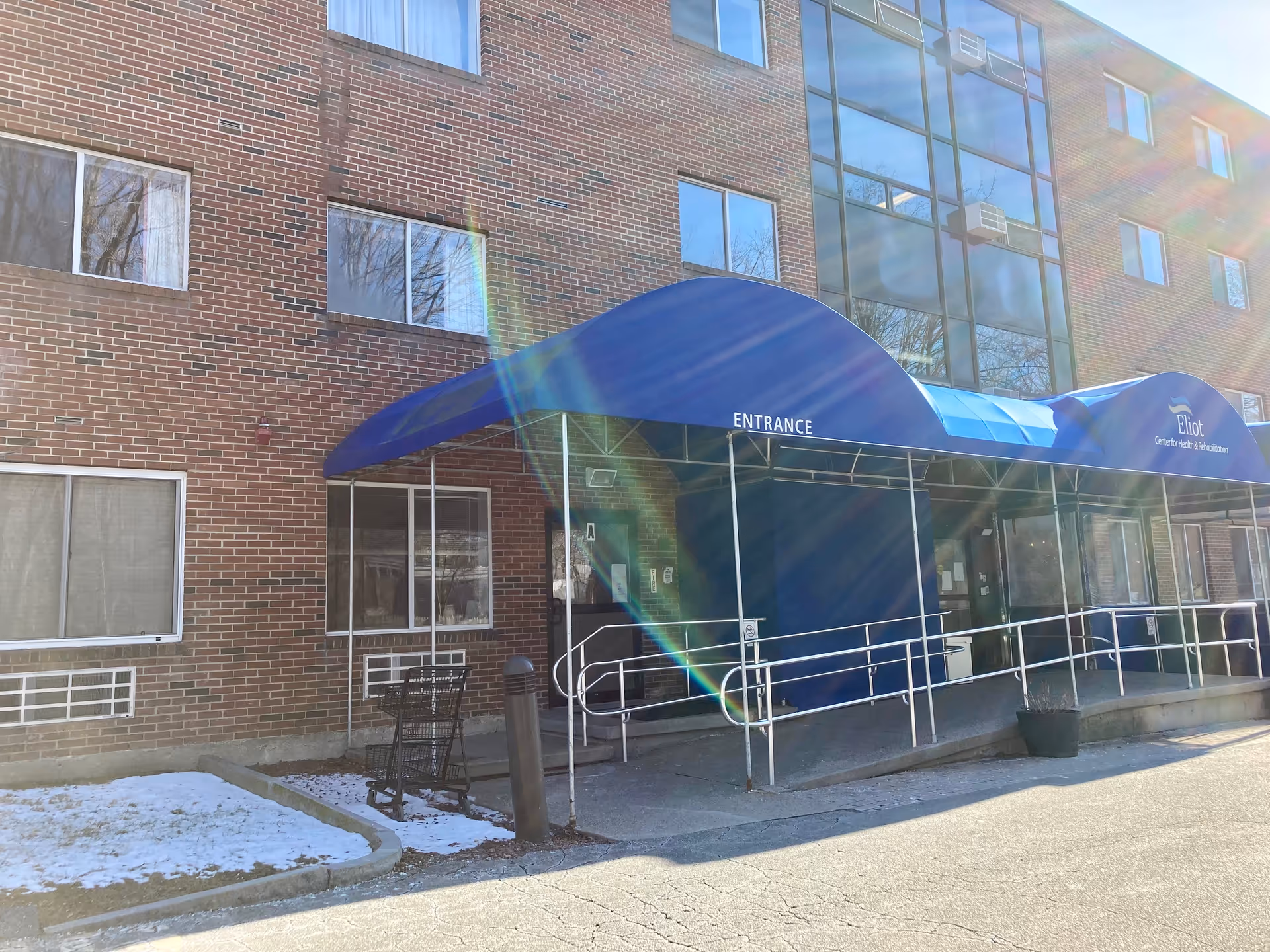 Exterior view of the Eliot Center for Health and Rehabilitation entrance.