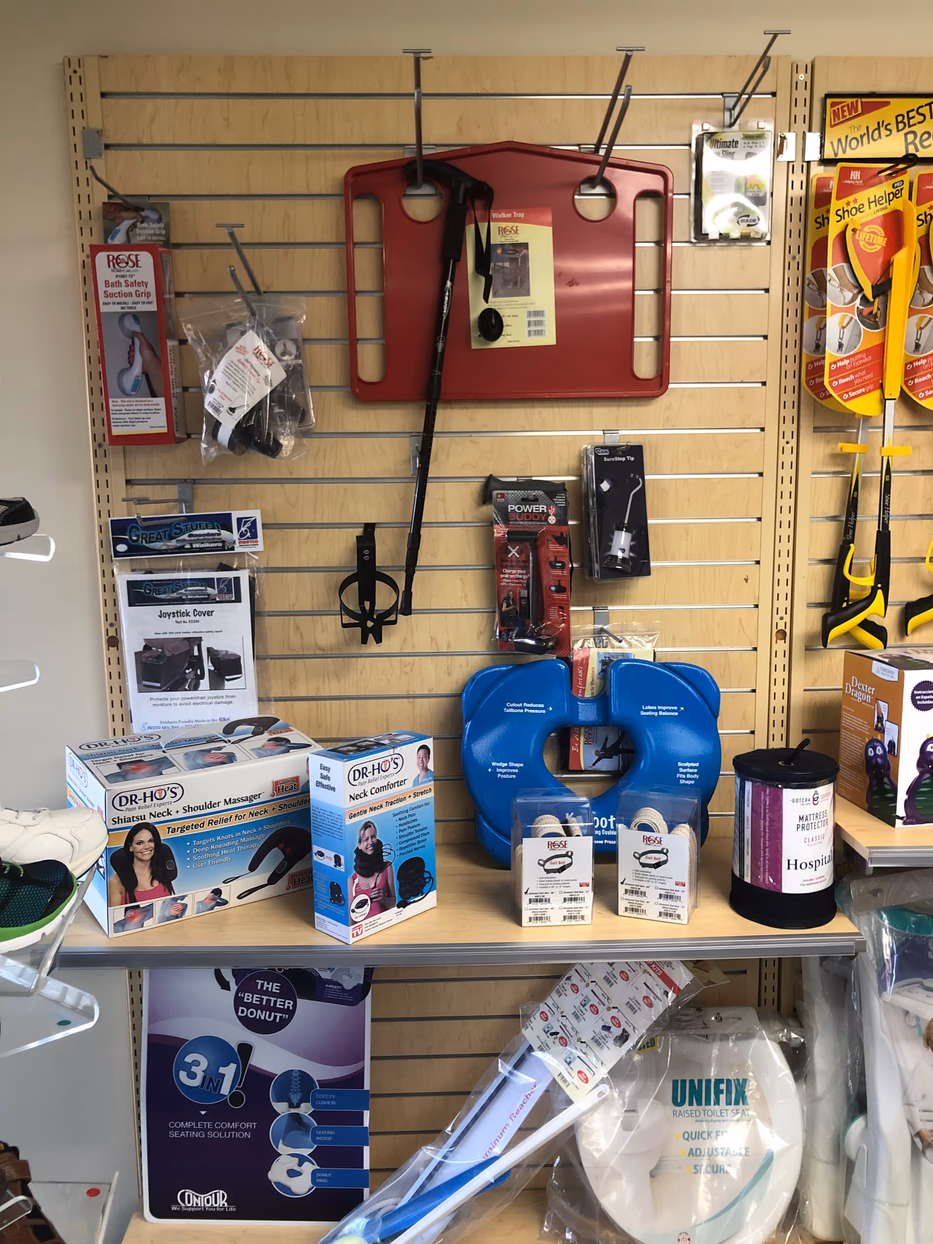 Slatwall display of medical supplies and mobility aids in a retail interior.