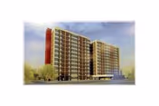 Exterior view of a modern multi-story senior living apartment building.
