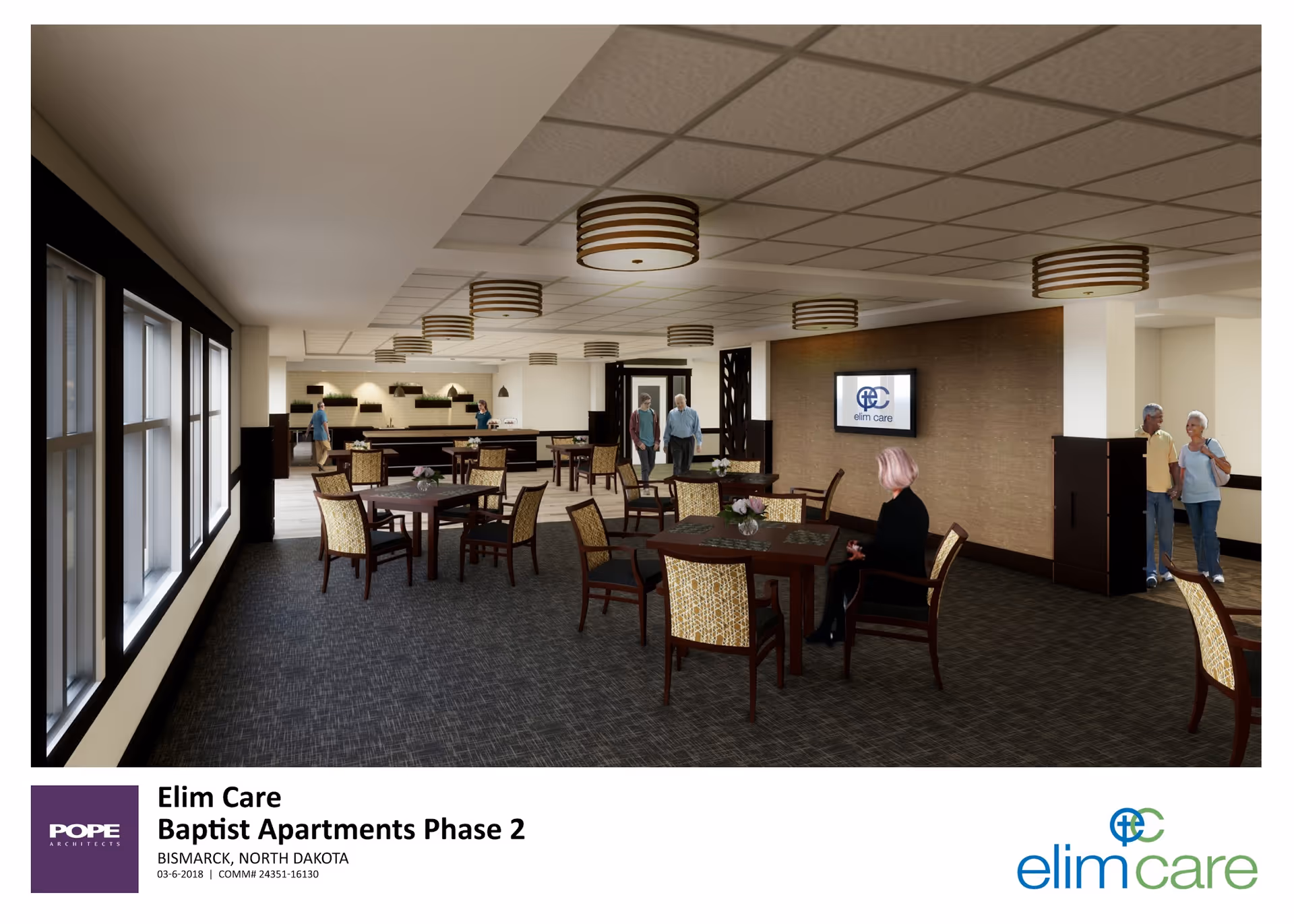 A dining/common area with multiple tables and chairs, pendant lights, and a few people in a senior living facility.