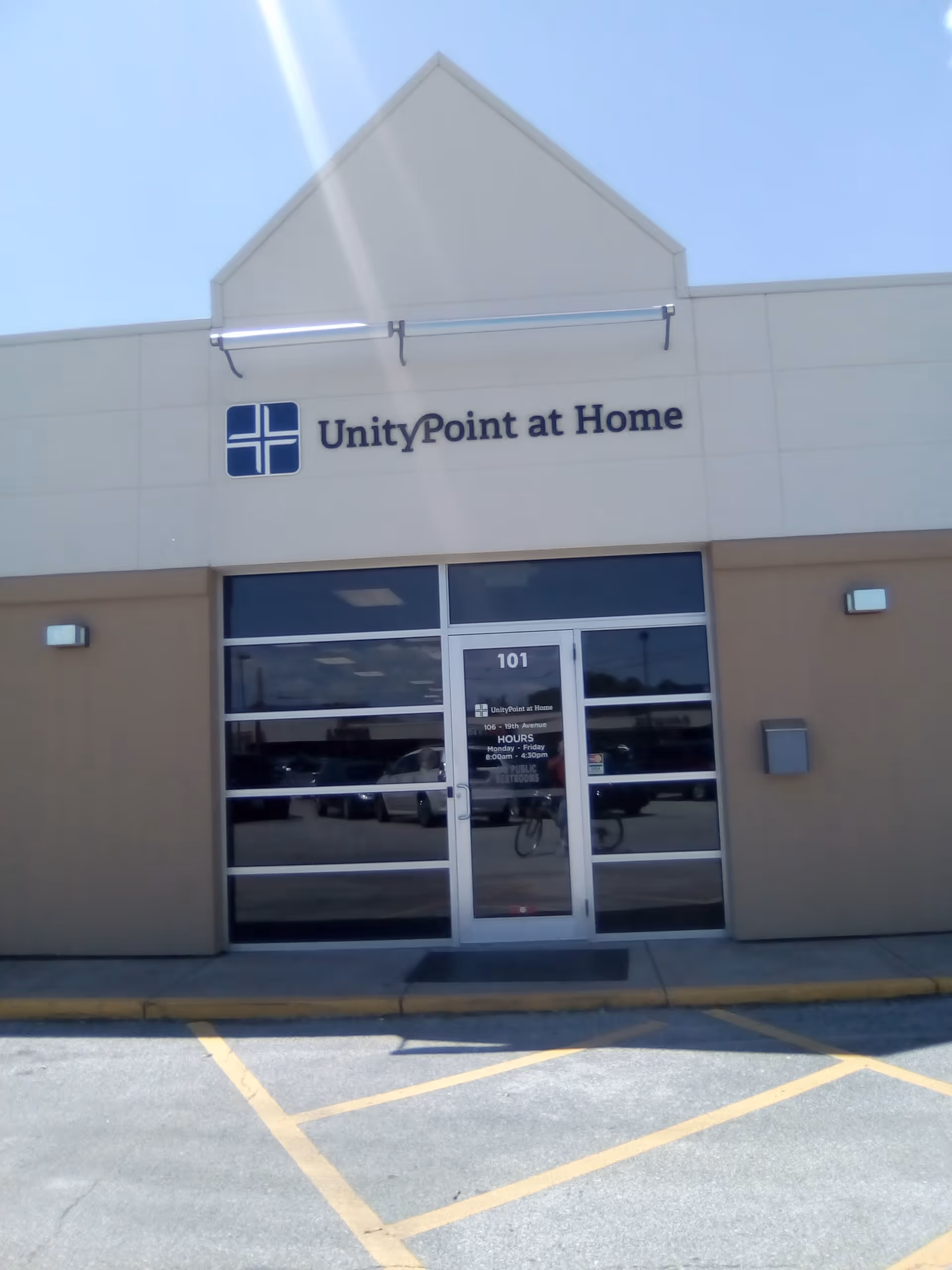 Front exterior of UnityPoint at Home entrance with glass doors