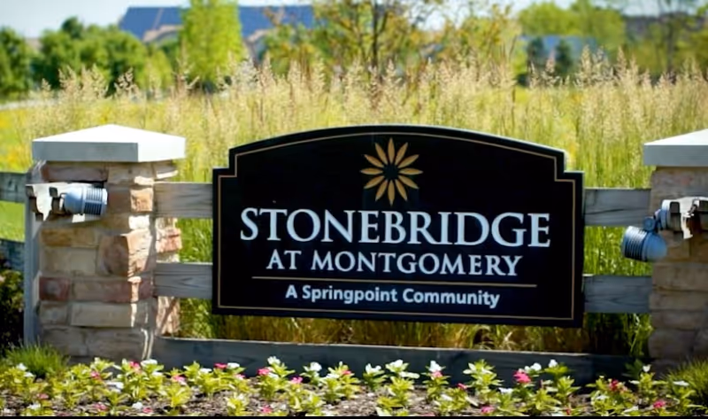Stonebridge at Montgomery sign with landscaping in front of the facility.