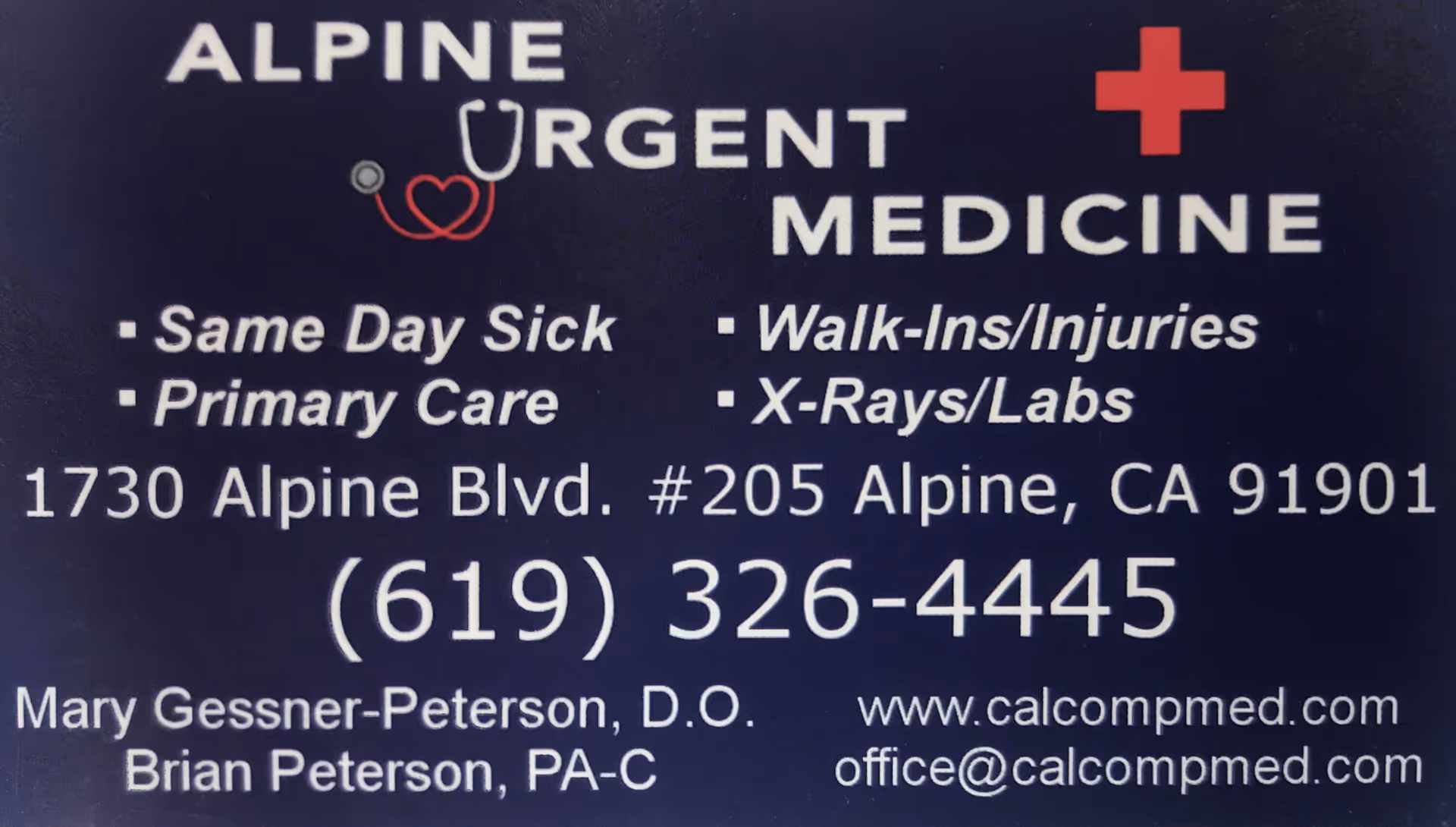 Dark blue sign advertising Alpine Urgent Medicine with services and contact info