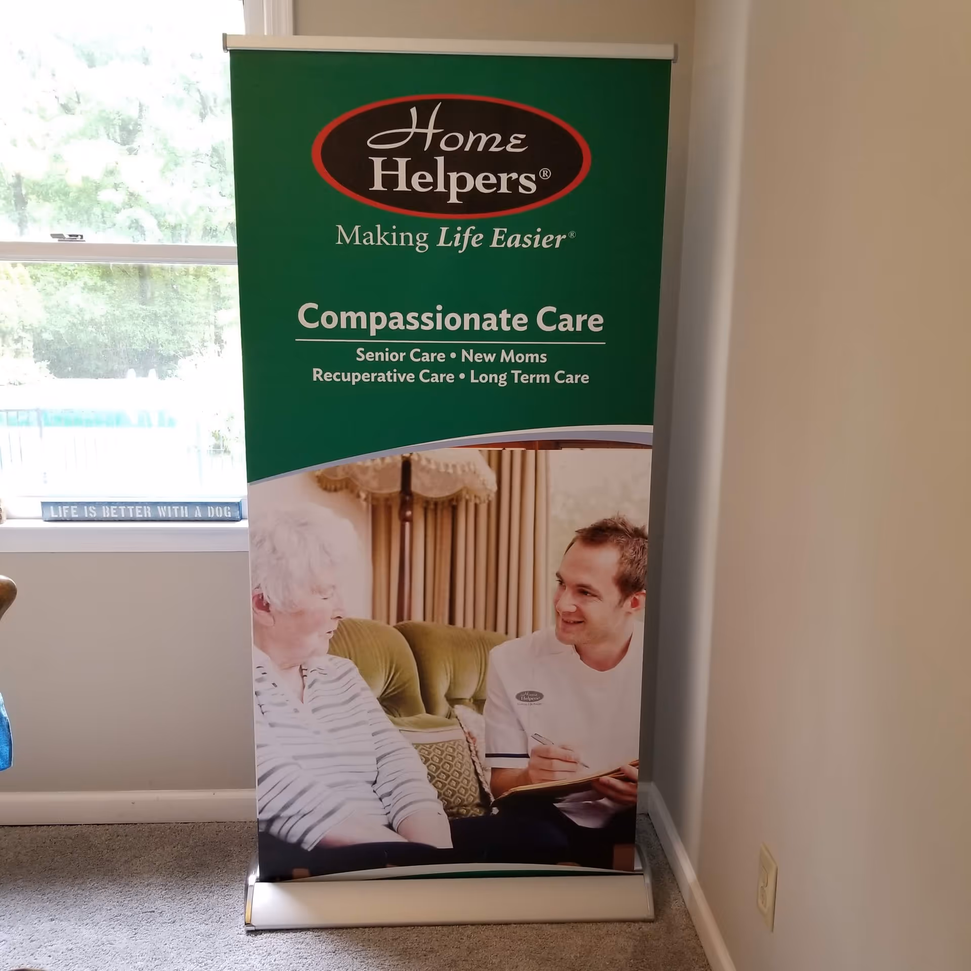 Green Home Helpers banner featuring a caregiver with an elderly woman indoors.