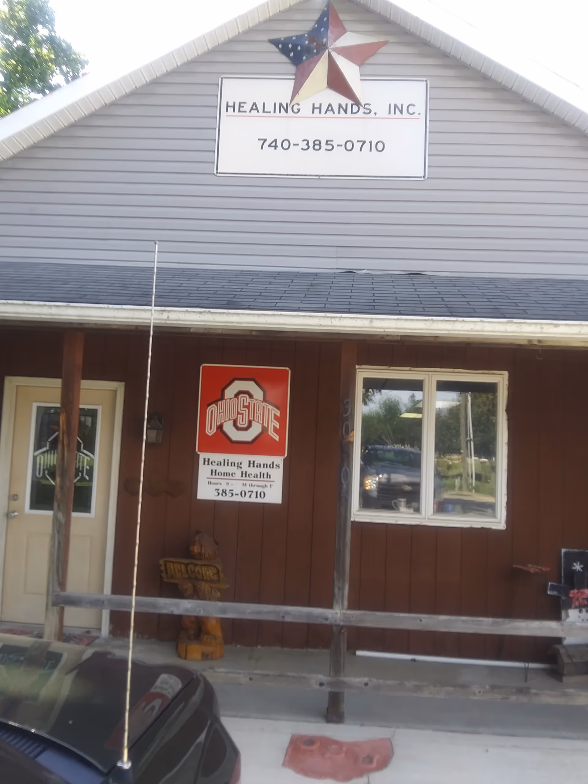 Front view of Healing Hands Home Health building with sign, Ohio State logo, and entrance.