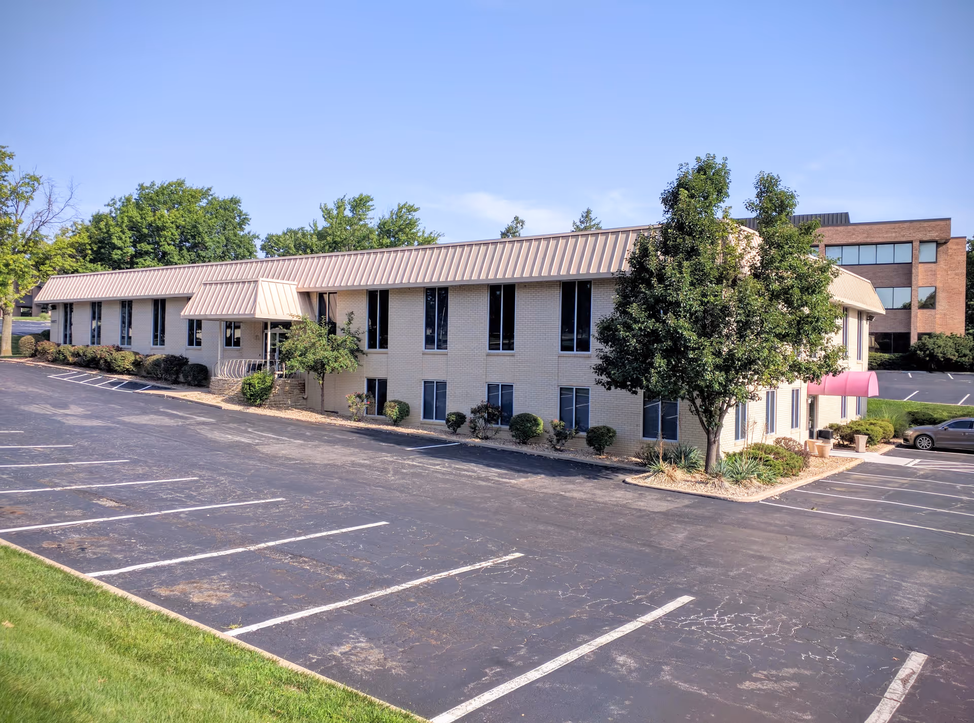 Exterior view of Interim HealthCare of Overland Park building with parking lot.