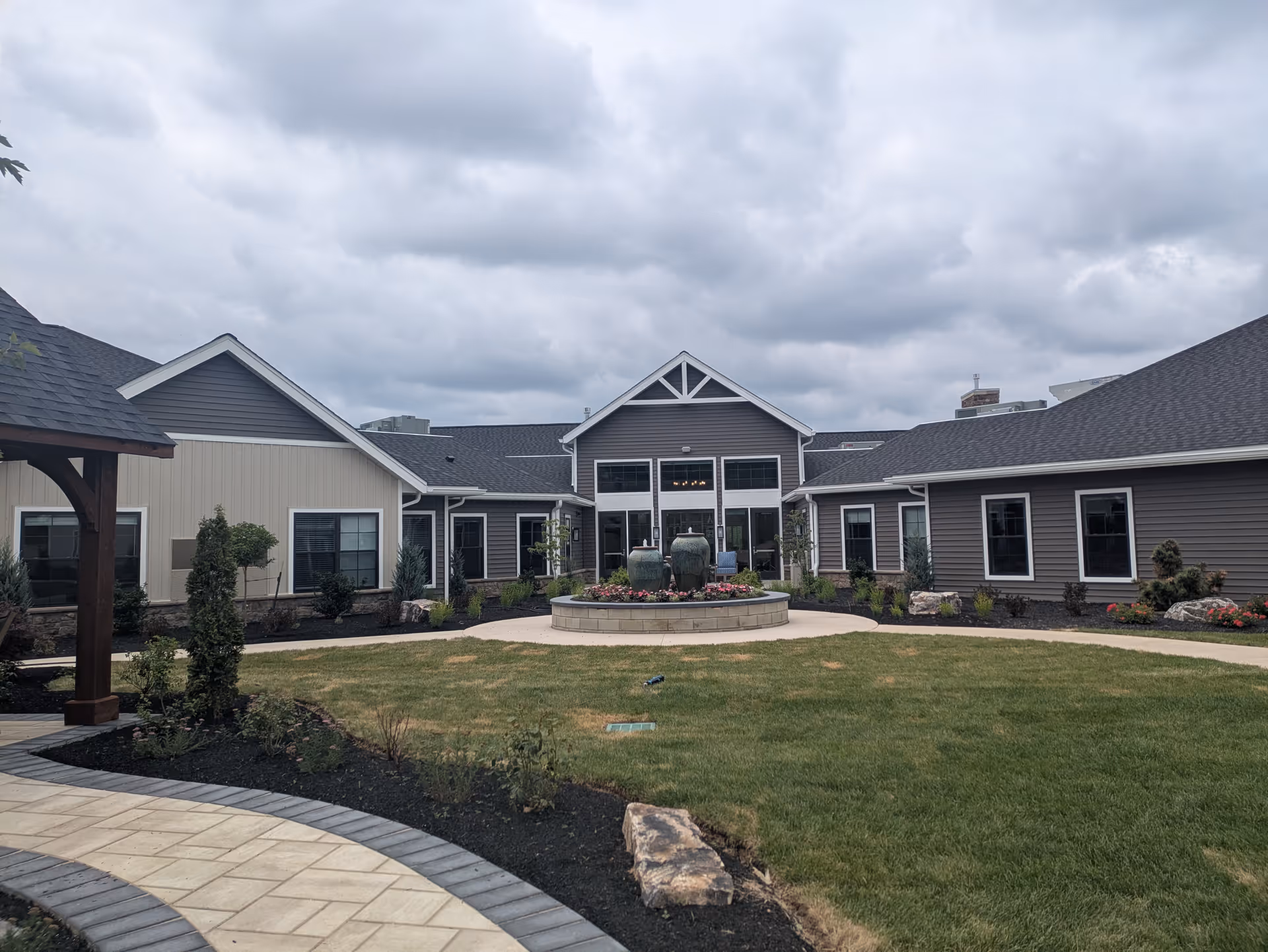 Exterior view of Homestead Heights of New Berlin with central entrance and courtyard.