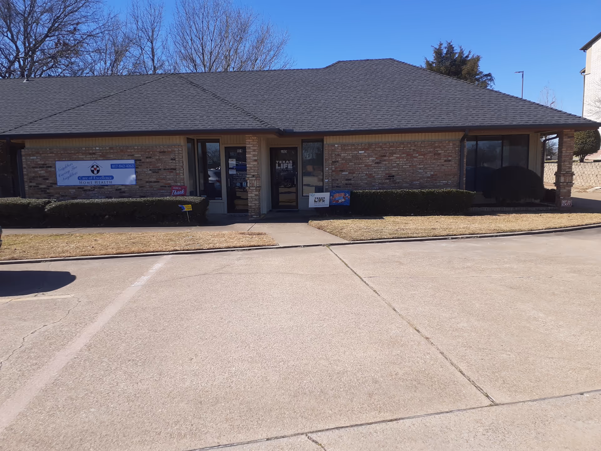 Front view of Care of Excellence Home Health, LLC building with brick exterior.