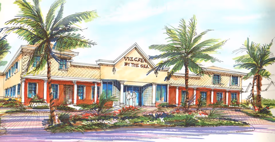 Illustrated front exterior of a two-story senior living building labeled "Vizcaya By The Sea" with palm trees and landscaped entrance.