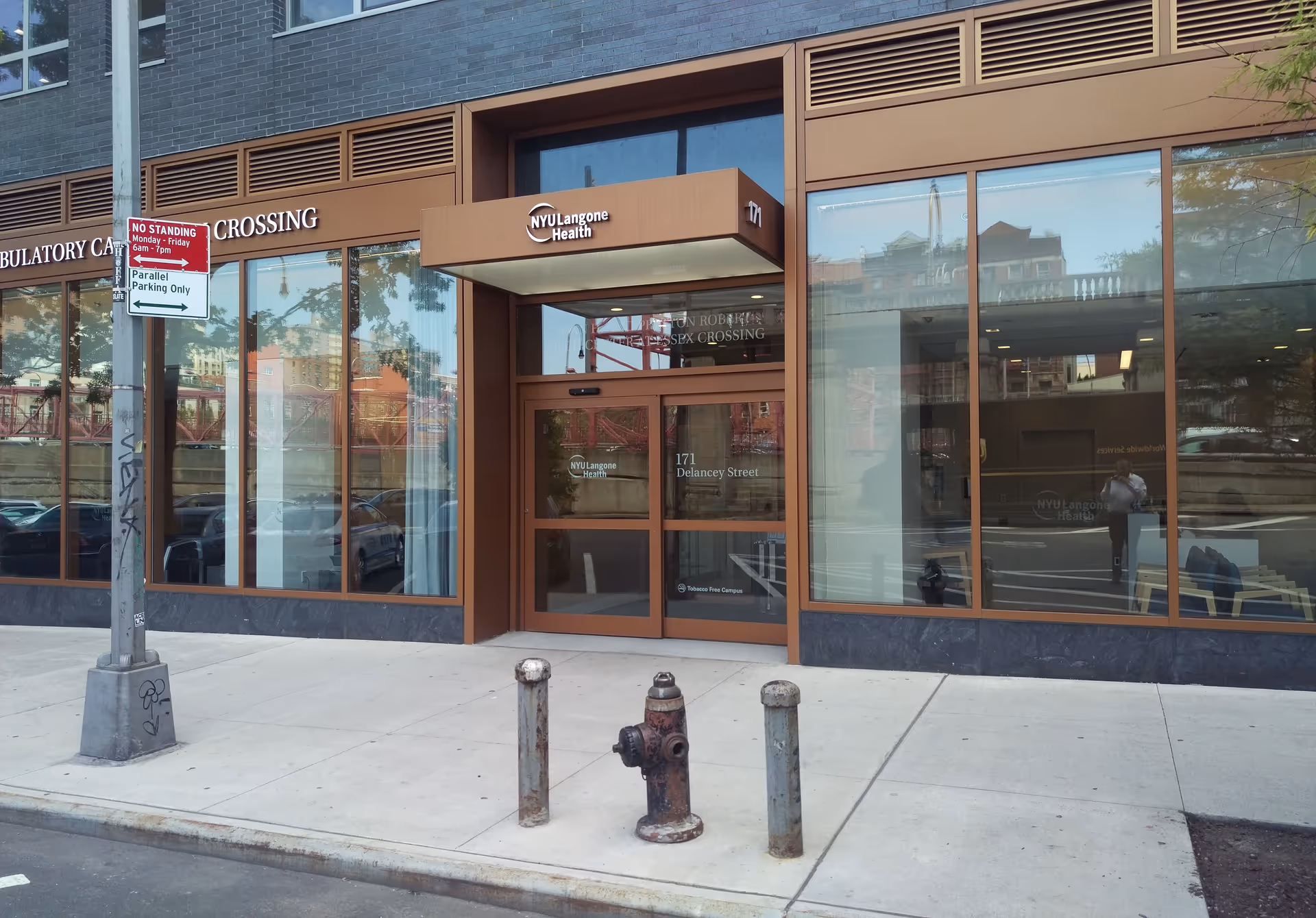 Exterior glass storefront of Joan H. & Preston Robert Tisch Center at Essex Crossing.