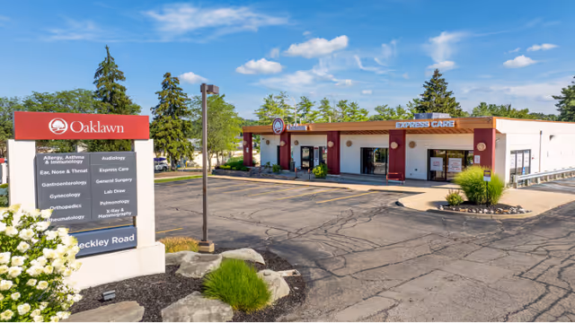Exterior view of Oaklawn Specialty Care Beckley Road facility with parking lot and entrance signs.