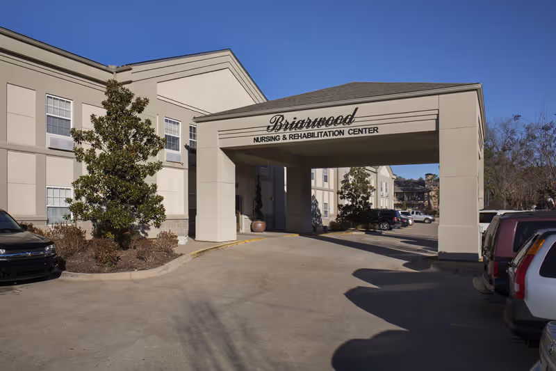 Briarwood Nursing and Rehabilitation Center exterior entrance with parked cars