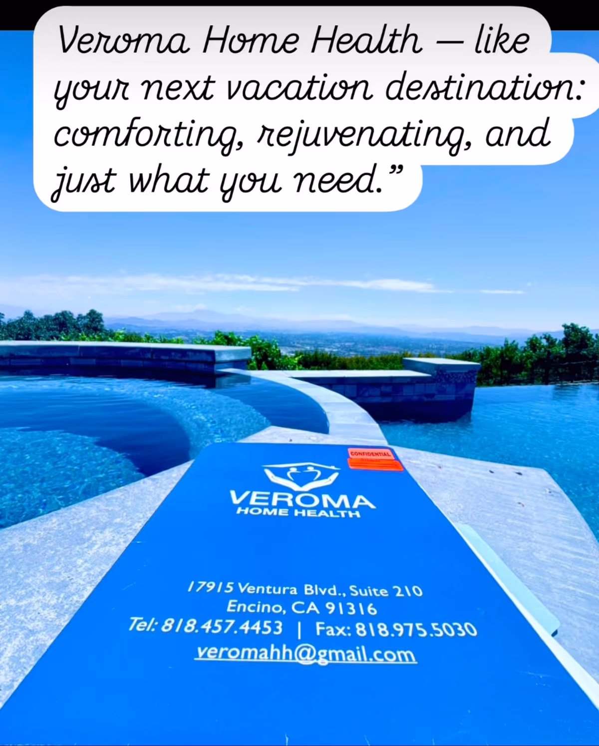 Blue outdoor pool deck with a Veroma Home Health brochure and distant hills.