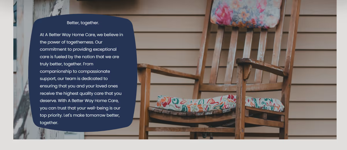 Wooden rocking chair with floral cushions on a porch, with blue text overlay.