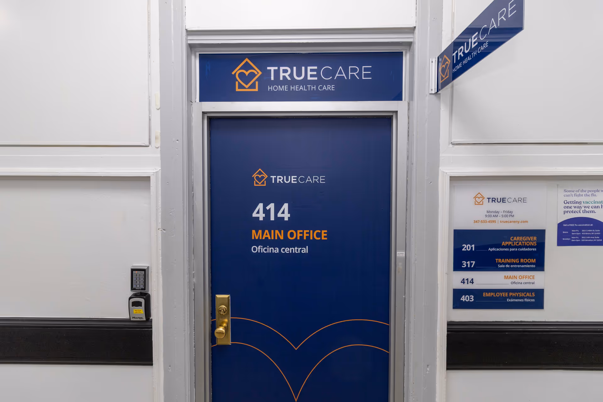 Blue door labeled Main Office with TrueCare signage in a hallway of the facility.