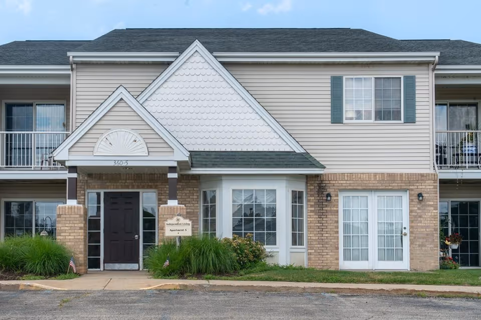 Front view of Addington Place of Lakeside Vista, a two-story senior living building.