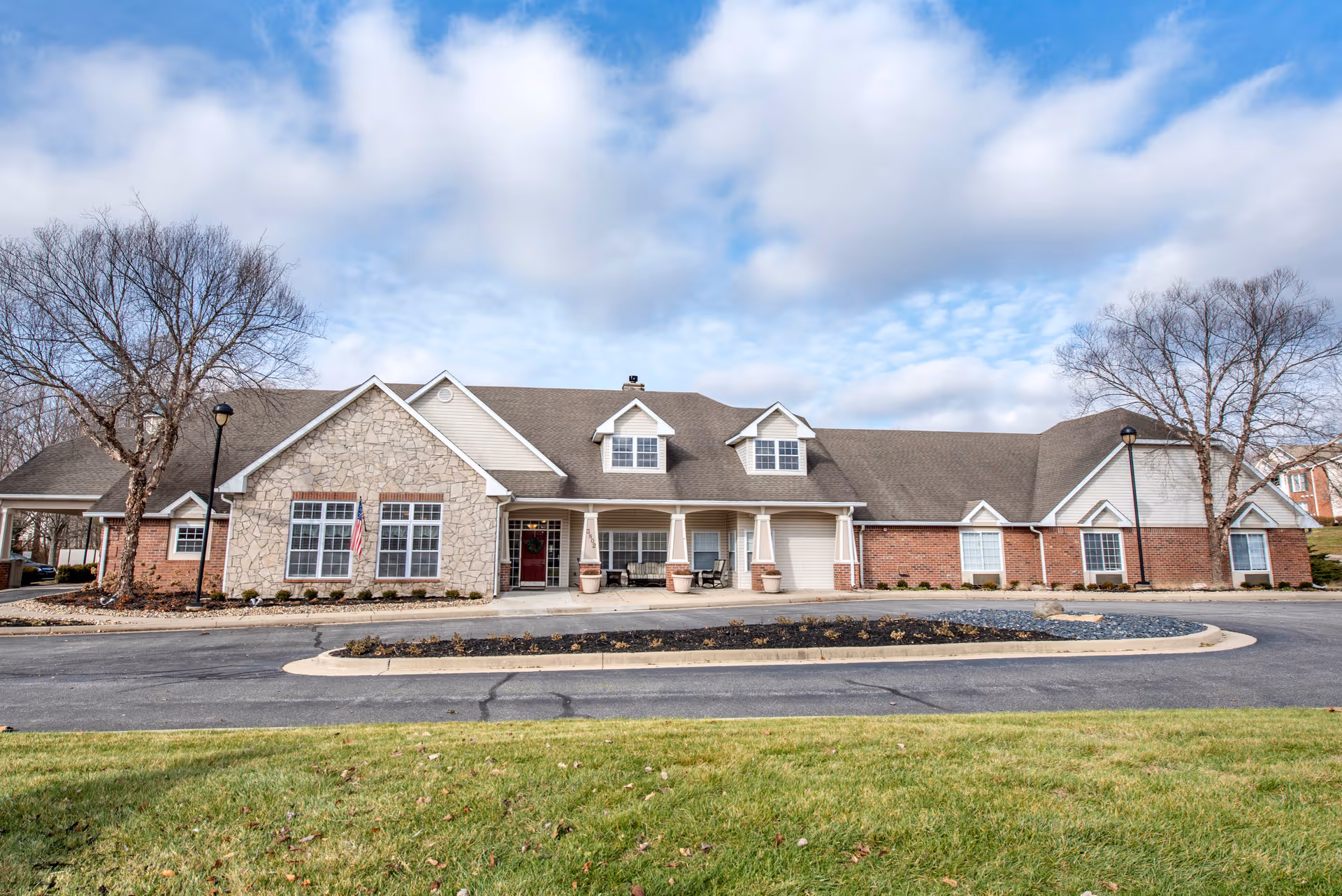 Front exterior of Commons at Jackson Creek with entrance and circular drive.